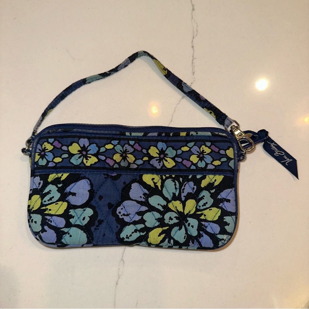 Vera Bradley wristlet. Indigo pop. Good but used condition.